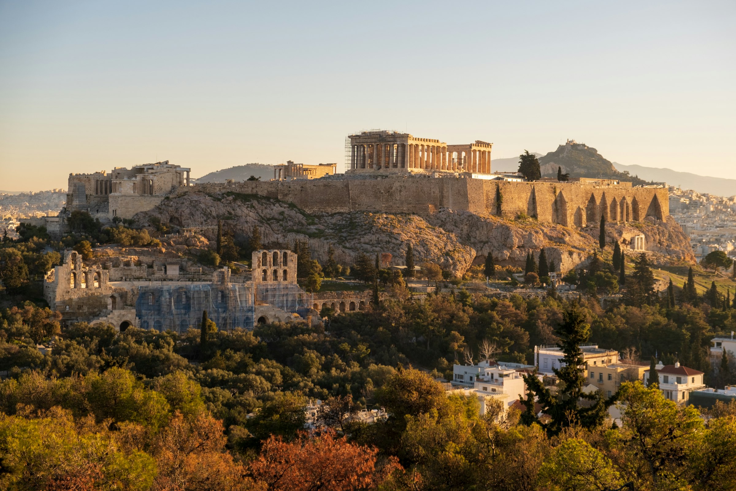The Acropolis and the Odeon of Herodes Atticus in late light. The finish is about a kilometre and a half to the east. Photograph: Kostas Vourou, Unsplash.