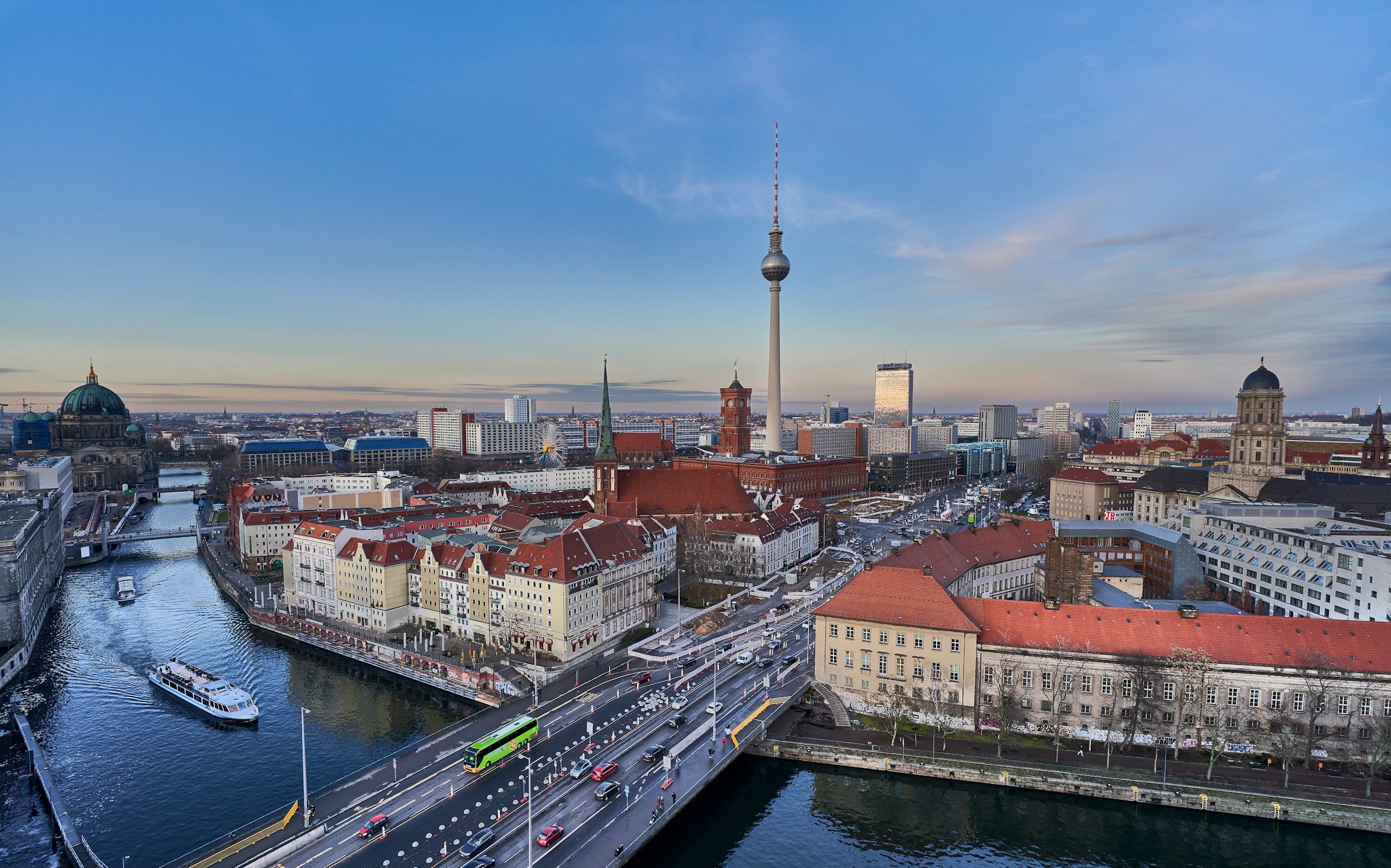 The river Spree curving through central Berlin, seen from above with a bridge in the foreground.