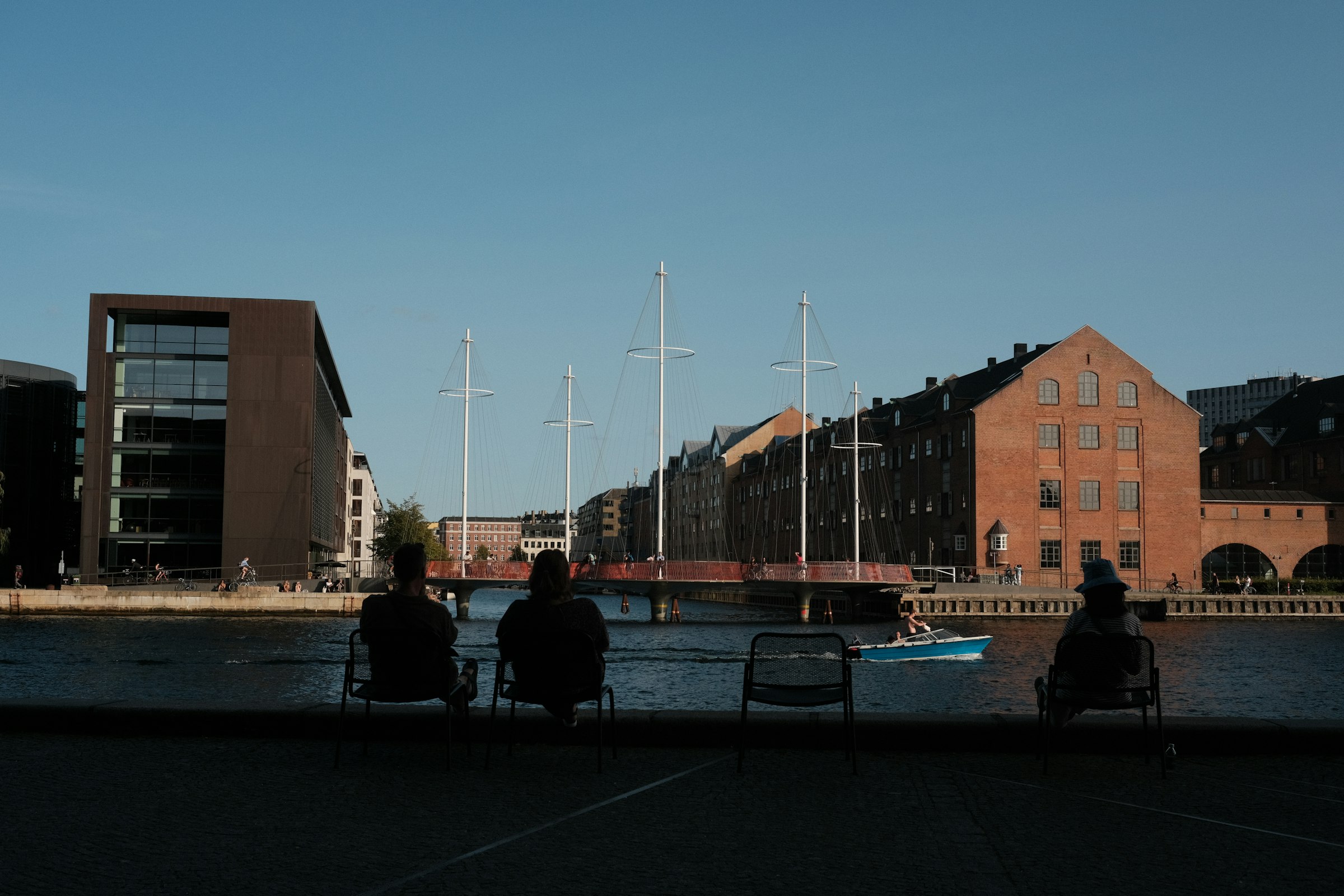 The harbour at Christians Brygge, with the masts of Cirkelbroen. The course runs along this quay at about 32.1 km. Photograph: Shuyi Liu, Unsplash.